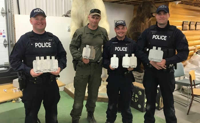 The RCMP marksmen team of Const. Joe Lewanczuk (St. Albert RCMP), Staff Sgt. Ron Parker (Edmonton Emergency Response Team), Const. Neal Reynolds, (Innisfail RCMP), and Const. 