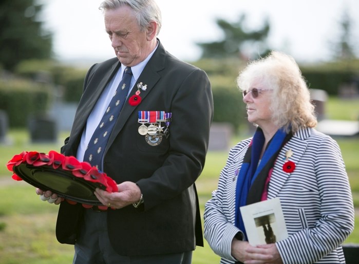 Chris and Diane Stephens, who flew to Canada from Oxford, England for the service, prepare for the laying of the Somme Wreath, which had the full support from the Royal