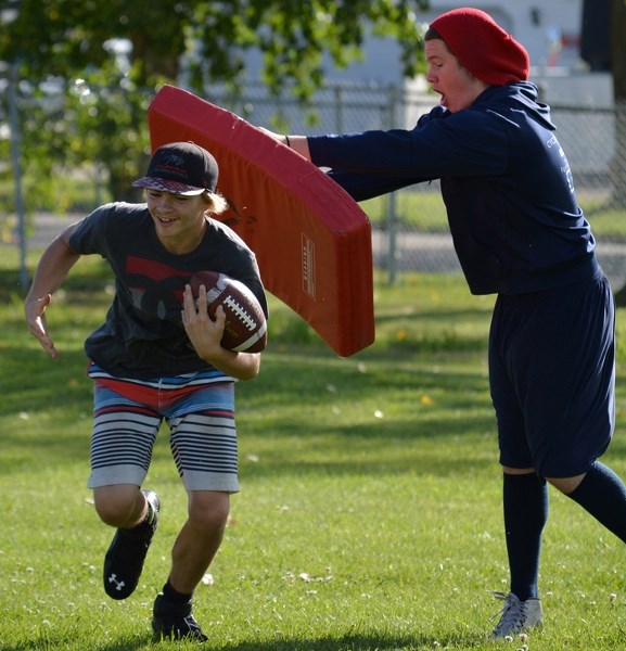 Bantam players with the Innisfail Minor Football Association go through some conditioning exercises during pre-season practice last week. The regular season officially gets