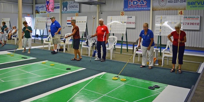 A total of 12 teams and 120 players took part in the 3rd annual Alberta Canadian Shuffleboard Association team tournament Aug. 8 to 12 at the Innisfail Curling Club.