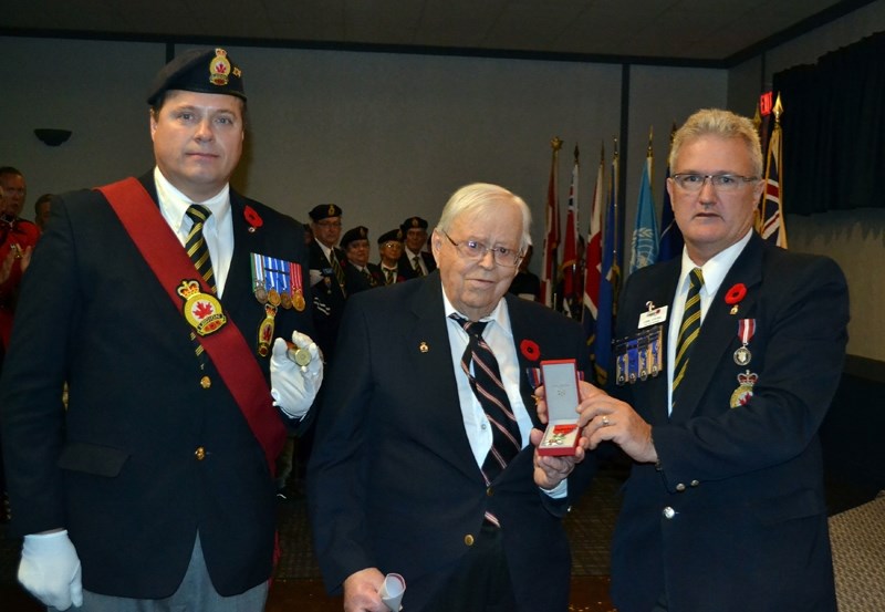 Numi Stefanson (centre) was honoured locally in 2014 for being the recipient of the National Order of the Legion of Honour, which is France&#8217;s highest order for military 