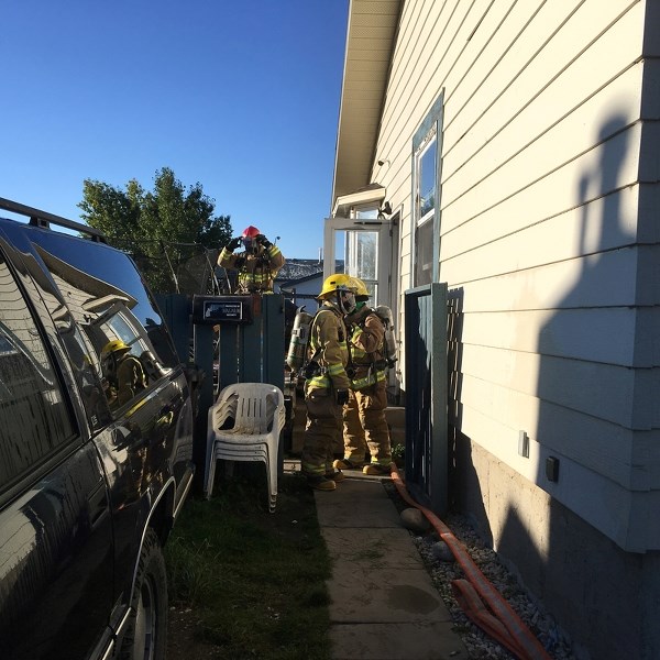 Penhold firefighters respond to a kitchen fire in a home on Larne Place Sept. 21.