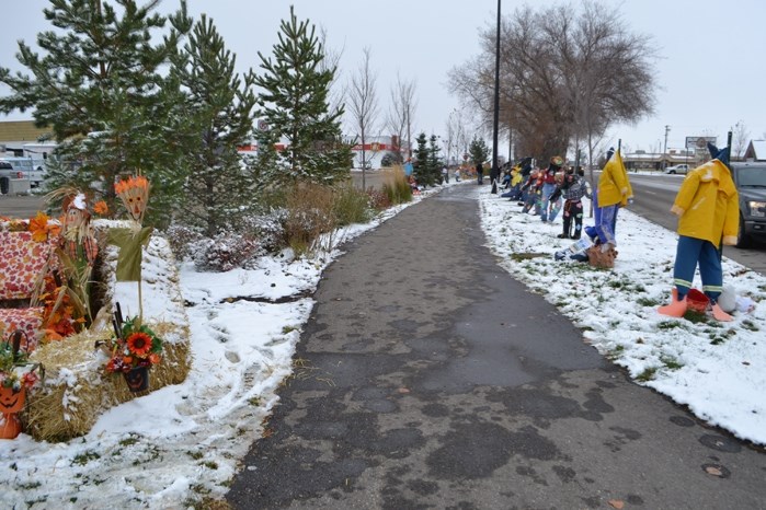 Organizers of the scarecrow festival said there were a record number of entries that were placed along the sidewalk on the north side of Main Street.