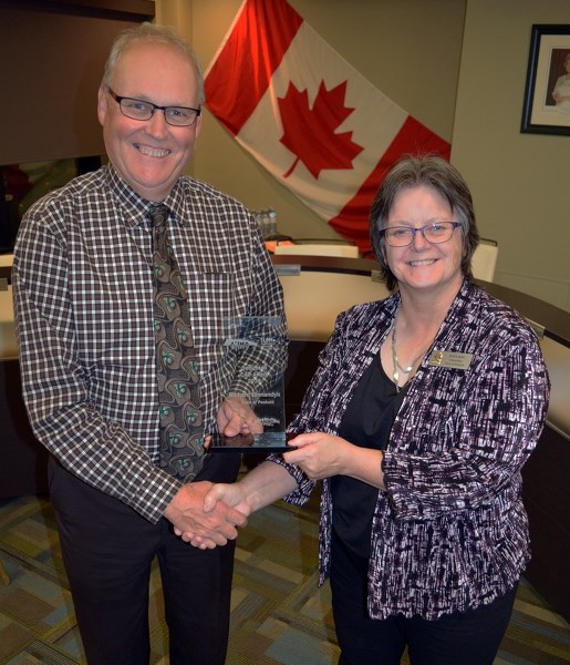 Penhold CAO Rick Binnendyk and Coun. Julia King received prestigious awards during the annual Alberta Urban Municipalities Association conference in Edmonton on Oct. 4.