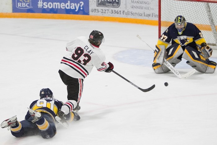 Innisfail Eagle Ty Clay breaks loose to take a shot on goal. Stony Plain won the game 4-3.