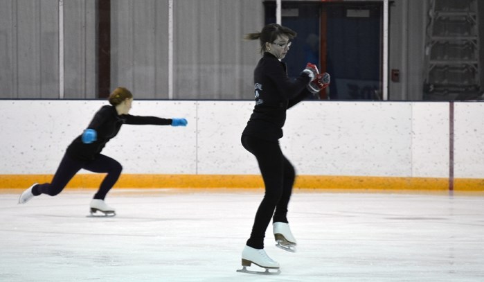 Figure skaters are seen here practising on the blue ice surface at Innisfail Arena. All user groups are sharing this ice surface for the next several weeks until ice returns