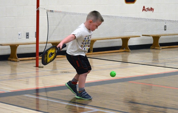 Innisfail&#8217;s Jacob Bergen, known to friends as Jakey B, tries his hand at pickleball during a drop-in session.