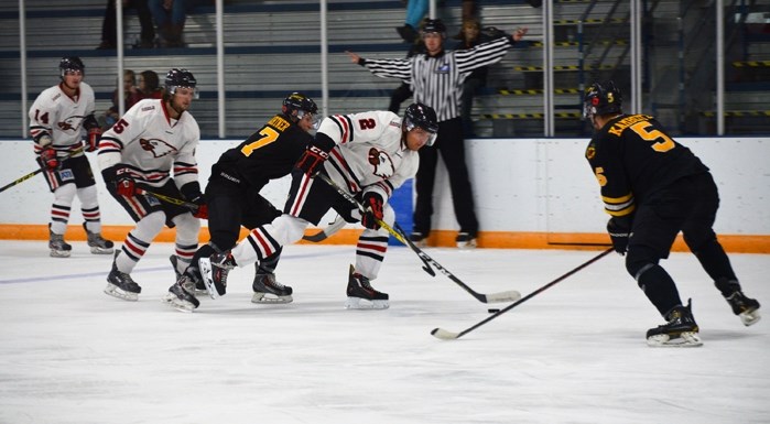 Eagles defenceman James Gardner carries the puck during second period action against the Fort Saskatchewan Chiefs Friday at home. The Eagles took the game 3-2.