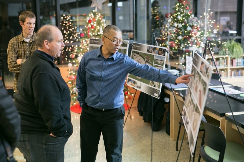 Henry Wong, the town&#8217;s director of community services, talks about the proposed Innisfail skatepark concept plan with Coun. Mark Kemball during an open house at the