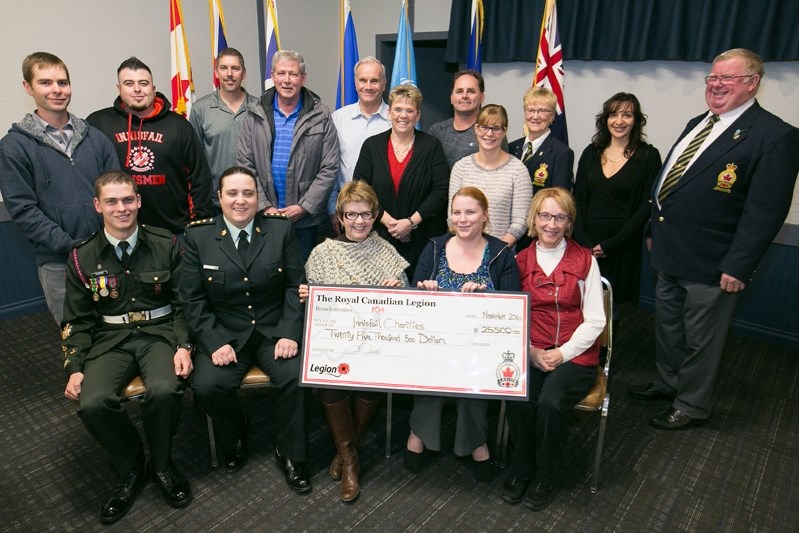 Representatives from nine local and area non-profit groups are all smiles after receiving donations totalling $25,500 on Nov. 22 from the Innisfail Royal Canadian Legion.