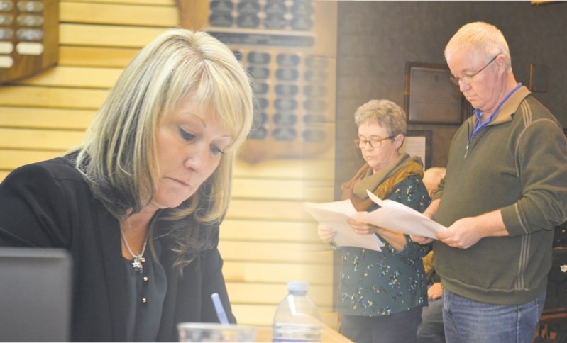 Helen Dietz, Innisfail chief administrative officer (left), and citizens Mary Flemming and Jim Carroll at town counil on Nov. 28. Flemming and Carroll presented a 14-question 