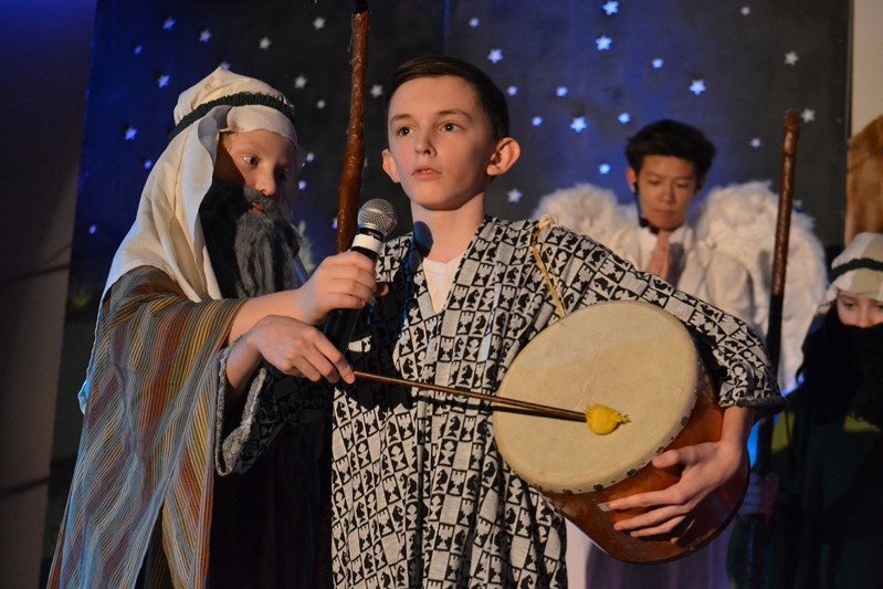 Shepherd Jeremy Rafuse and Little Drummer Boy Jacob Mydland &lt;br /&gt;capture the miracle at St. Marguerite Bourgeoys School during the Dec. 14 performance The Birth of