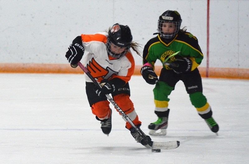 The Innisfail Atom Female team took its annual tournament title with a 2-0 victory over the Okotoks Atom Gold on Dec 18 at the Innisfail Arena.