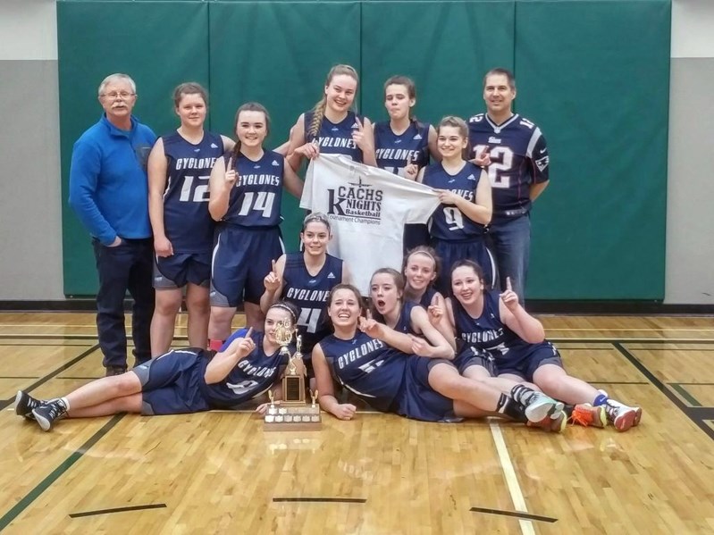 The Innisfail High School senior girls basketball team shows off its trophy and its top place win, taking gold in the Central Alberta Christian High School tournament in