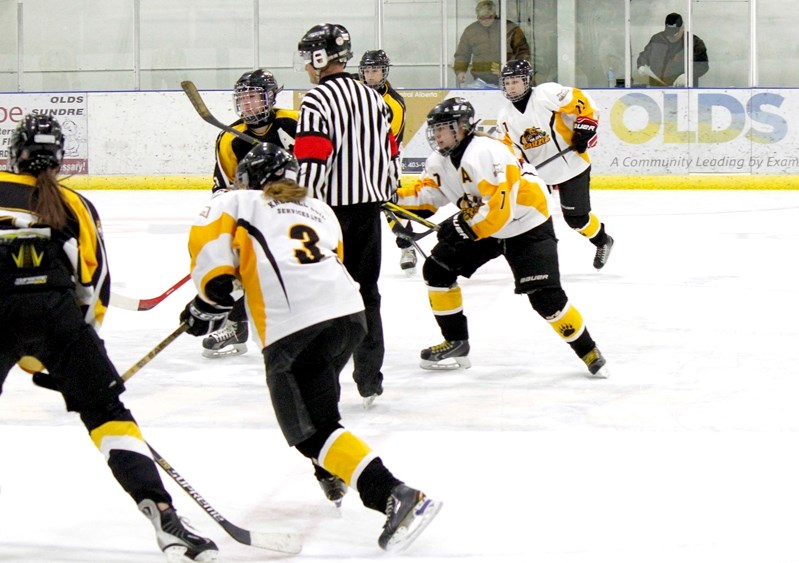 The female midget Olds Grizzlys are seen here during a recent game. The team has three Innisfail players, including Camryn Fuller (#17) and Bradie Pillman (#7) and