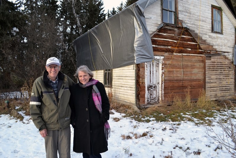 John Thomson and Anna Lenters at the current farm site of the Sinclair House, eight kilometres west of Innisfail. Thompson and his family have agreed to cover the cost of