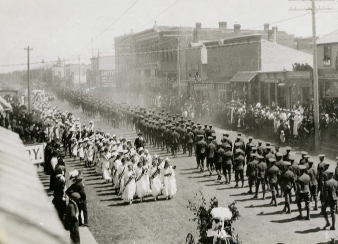 Grand parade for the 187th Battalion down Main Street in Innisfail in 1916.