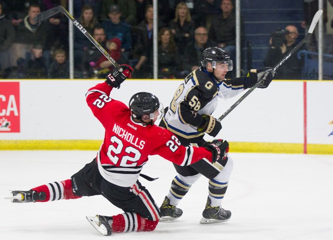  Innisfail Eagles player Dan Nichols gets tripped up during the Eagles game against the Lacombe Generals at the Gary Moe Sportsplex on April 13. Noel West/MVP Staff