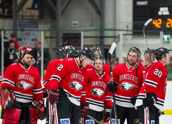 Innisfail Eagles players line up after losing the game 2 to 5.