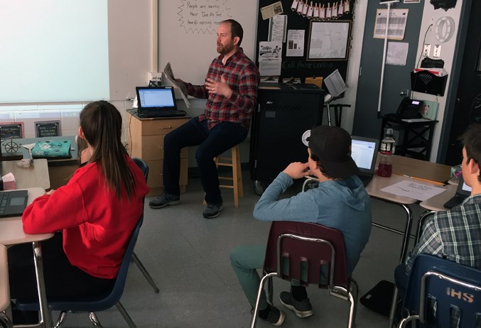  Noel West, photographer for Mountain View Publishing, presented a PowerPoint presentation on photography for Grade 8 students to help them with their journalism projects.