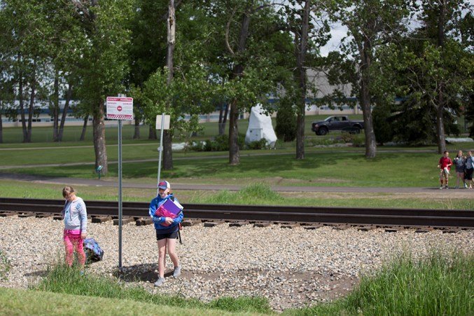  Each school day the CP tracks at an area known as White Rock Crossing are illegally crossed by young students to get to classes in the morning and to later come home after school.