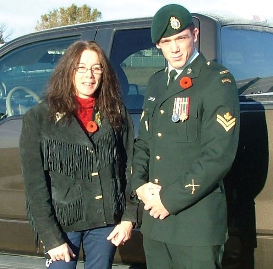 Missing soldier Richard Curnow poses with his mother before the Remembrance Day service held in Carstairs last November.