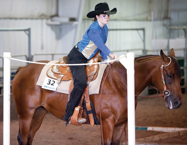 Rachel McConney of the Ropes and Reins 4-H club competes in the level 4 trail class at the Calouri Pavilion at the Olds Ag Society grounds last week.