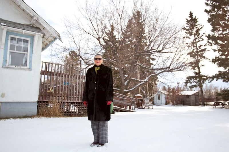 Mayor Judy Dahl stands on the property at 50 Street and 54 Avenue. Council has discussed the use of the property for the site of aa future civic centre.