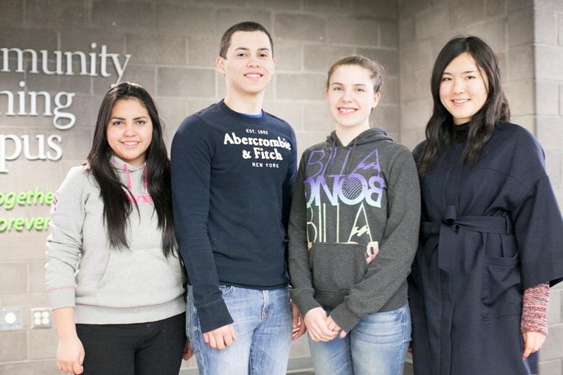 From left: Olds High School exchange students Marian Manzo, Ricardo Carniro, Maren Grabe and Mayuka Yamamoto at Olds High School on Jan. 8. CLICK ON PICTURE TO ENLARGE