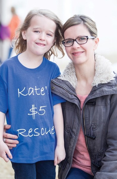 Grade 1 student Kate Manning, pictured with her mother Aaryn at Olds Koinonia Christian School, raised $9,400 for efforts to build a well in a developing country. CLICK ON