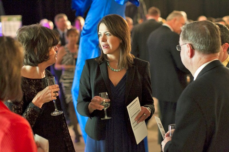 Wildrose Party leader Danielle Smith speaks with others during the Olds College gala on March 21.