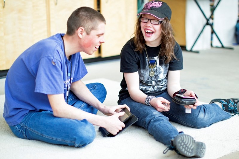 Students Adam Johnson (left) of Olds and Dallas Musselman of Sundre hang out in the Olds Horizon School&#8217;s green room during the school&#8217;s observance of World