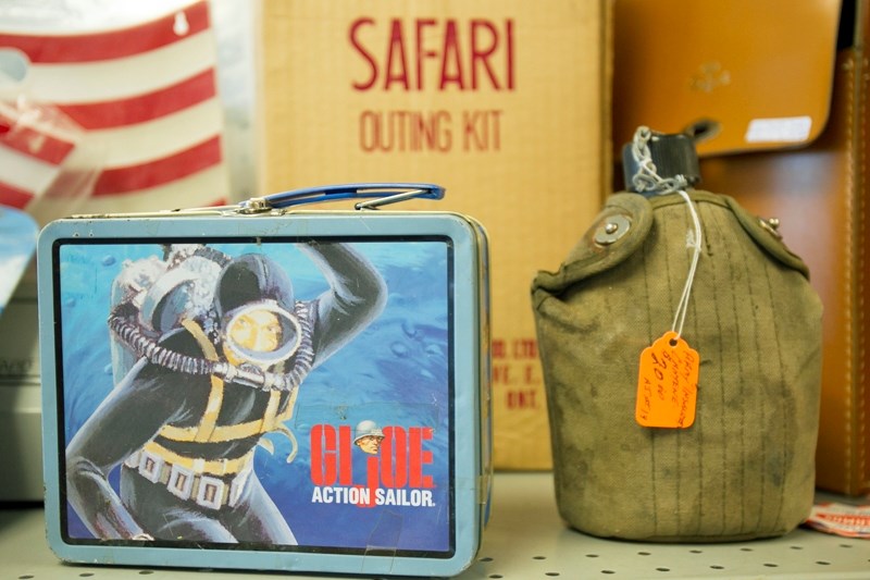 A G.I. Joe lunchbox and an army canteen are two of the many diverse items for sale at an antiques and collectibles store in Olds&#8217; downtown core.