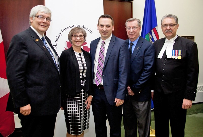 Jason Dewling (centre), Olds College&#8217;s vice-president of academics and research, is one of nearly 60 Canadians nominated for the Ernest C. Manning Awards Foundation