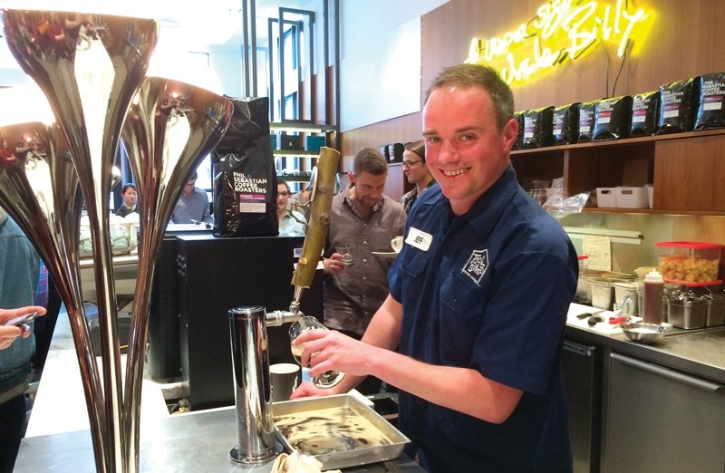 Jeff Orr, co-founder of Tool Shed Brewing, pours a pint of the Night Owl coffee stout at a launch party on April 22. The beer was the result of a collaboration brew between