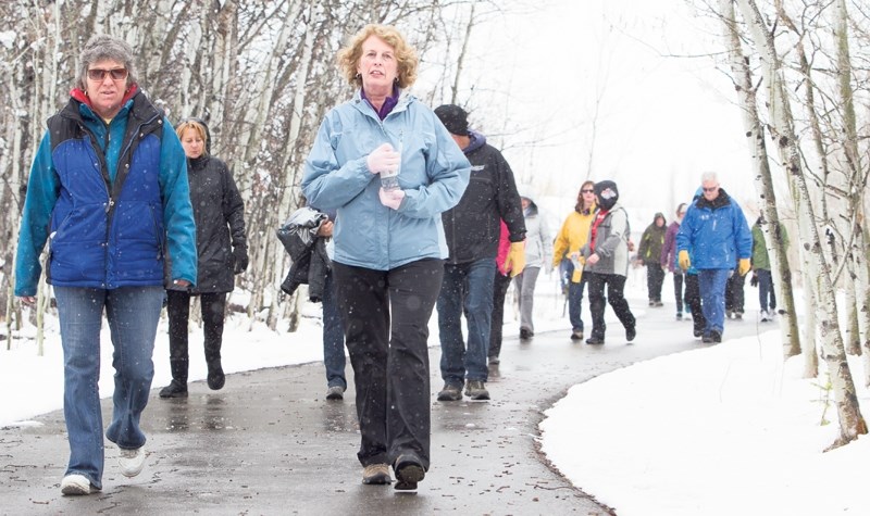 Participants defied unseasonal weather during the Hike for Hospice through Olds on May 3. The event raised $16,670 with the proceeds going to expanding palliative care in the 