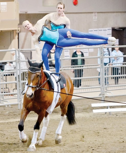 Jeanine (standing) and Angelique Vandersluijs will be competing at the 2014 Alltech FEI World Equestrian Games later this summer. Their sport is horse vaulting, which