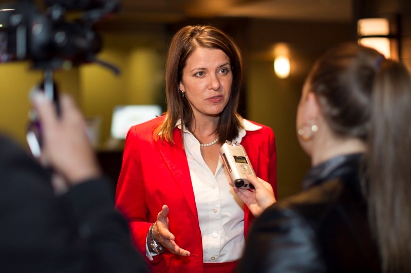 Wildrose leader Danielle Smith speaks with journalists during a Wildrose Oktoberfest fundraiser at the Pomeroy Inn and Suites on Oct. 23.