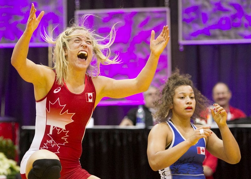 Danielle Lappage celebrates after defeating Braxton Stone during their second match to secure a spot on the Canadian Olympic team next year in Rio.