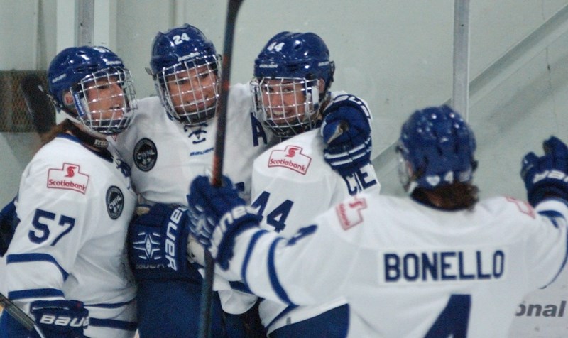 Toronto Furies forward and Canadian national team player Natalie Spooner (No. 24) celebrates one of her five goals against the Calgary Inferno on Dec. 6 in Olds.