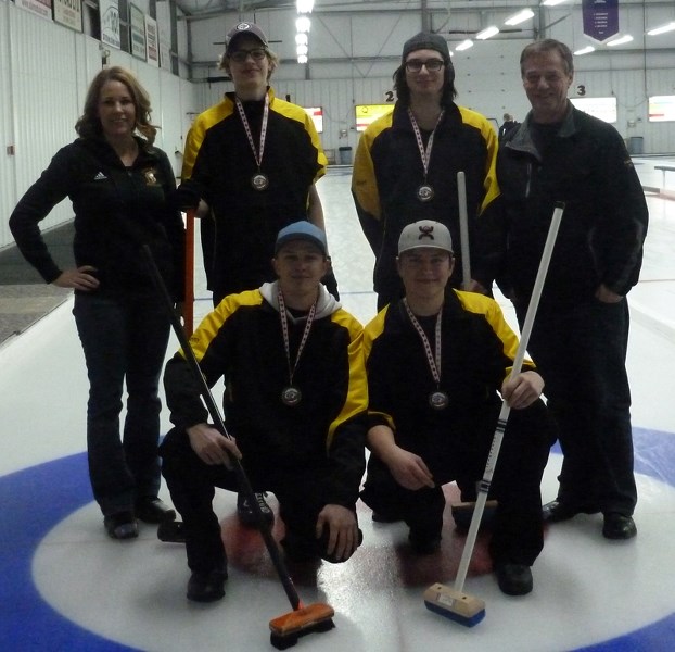 Members of the OHS Spartans boys curling team are Jeremy Mercier (skip), Michael Patton (third), Landon Hickock (second) and Morgan Kirton (lead).