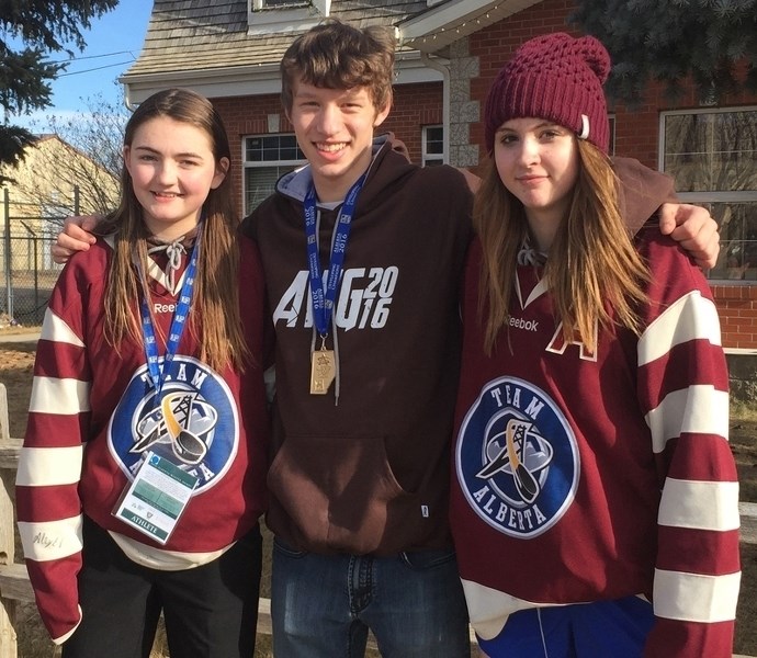 From left, Cremona&#8217;s Madison Black, Olds&#8217; Anthony Walsh and Emma Dixon. The three were local athletes who competed at the 2016 Alberta Winter Games in Medicine