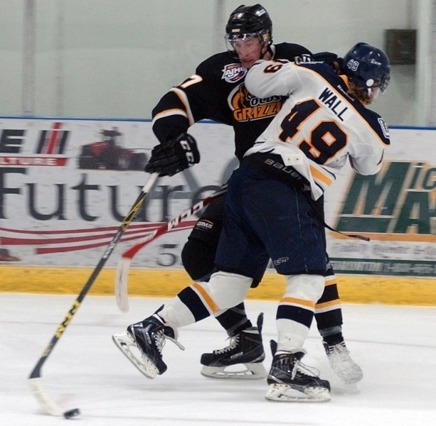 HITTING A WALL &#8211; Victory was just out of reach for the Olds Grizzlys on Feb. 27. Before a crowd of 637 at the Olds Sportsplex, the Grizzlys outshot the Calgary Mustangs 