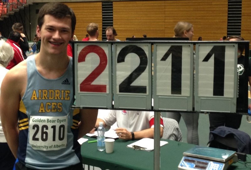 Andreas Troschke at the Golden Bear Challenge, an indoor track meet in Edmonton on Feb. 12. He set a new provincial weight throw record for his age class, throwing 22.11