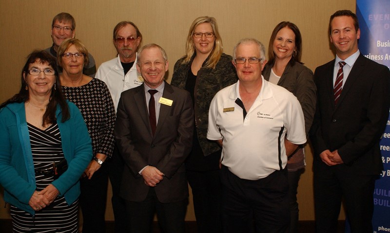 Members of the Olds and District Chamber of Commerce gather at the chamber&#8217;s annual general meeting at the Pomeroy Inn &#038; Suites March 9. From left (front row):