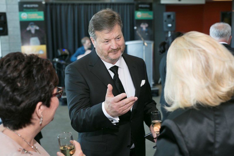 Partner of the Year 2016 recipient Ben Meyer speaks with Mayor Judy Dahl at a reception before the annual Olds College Gala at Olds College on April 7.