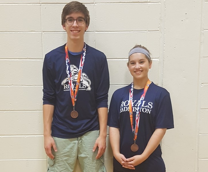 Olds Koinonia students Bryce Parrott and Kennedy Coates with the bronze medals they won in mixed doubles at the 2016 ASAA Badminton Provincial Championship in May.