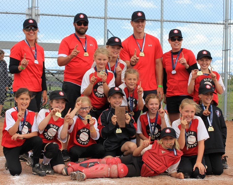 The U-10A Pistols after winning the Softball Alberta provincial championship earlier this month. They defeated St. Albert 11-5 in the final game. From left to right: coaches