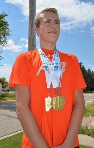 Bowden swimmer and former Innisfail Dolphin Justin Valentine proudly displays his medals earned at this year&#8217;s Alberta Summer Games in Leduc July 14 to 17.