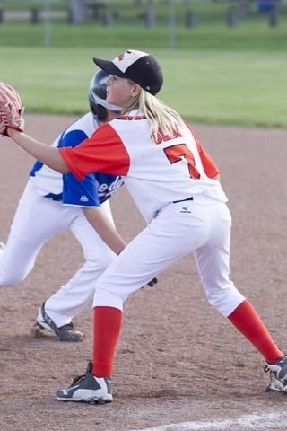 Olds Pee Wee Spitfires player Brynlee Rice gets ready to tag a Lacombe Dodger player who was attempting to steal at first base.